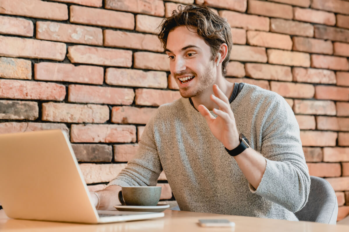 young attractive caucasian man talking online usin 2026 03 17 20 13 55 utc